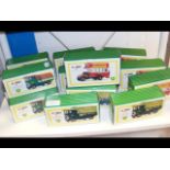 Fourteen boxed Corgi die cast trucks and busses