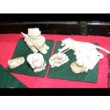 Six small carved ivory netsukes - figures and anim