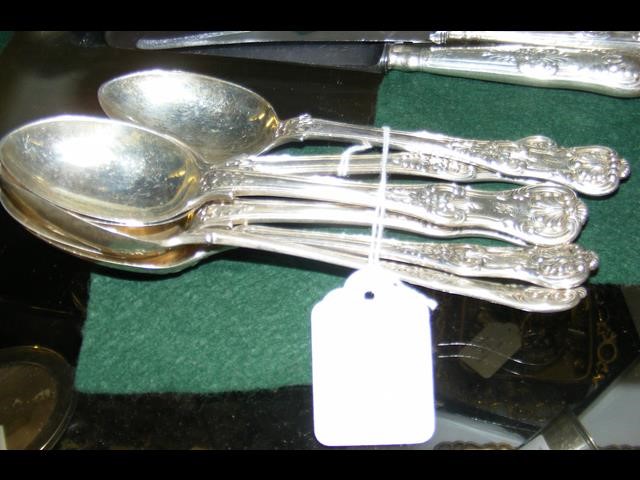 A set of six silver Kings Pattern dessertspoons