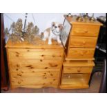 A pine chest of drawers together with two bedsides