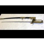An antique Officer's sword with leather scabbard -
