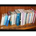 A large selection of books relating to making Trou