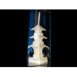 An ornately carved ivory of a pagoda - 40cm