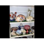 Two shelves of collectable ceramic ware including c