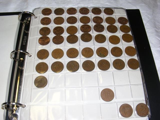 An album with over 400 coins and tokens, starting