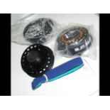 Three spare fly fishing spools