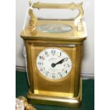 A Schmid Contessa 8 Day brass cased clock, ret