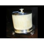 An antique ivory and silver plated biscuit barrel