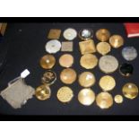 A selection of collectable compacts and a ladies m