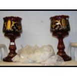 A pair of Victorian lustres in cranberry glass and