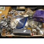 A box of silver plated ware, including candelabra