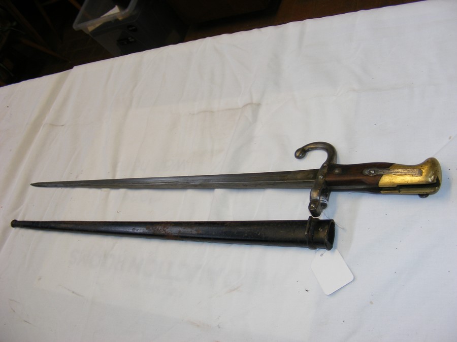 An old sword with metal hand guard, together with - Image 10 of 22