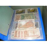 An album containing various collectable banknotes