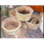 Four octagonal garden planters