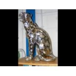 A large silver effect leopard statue