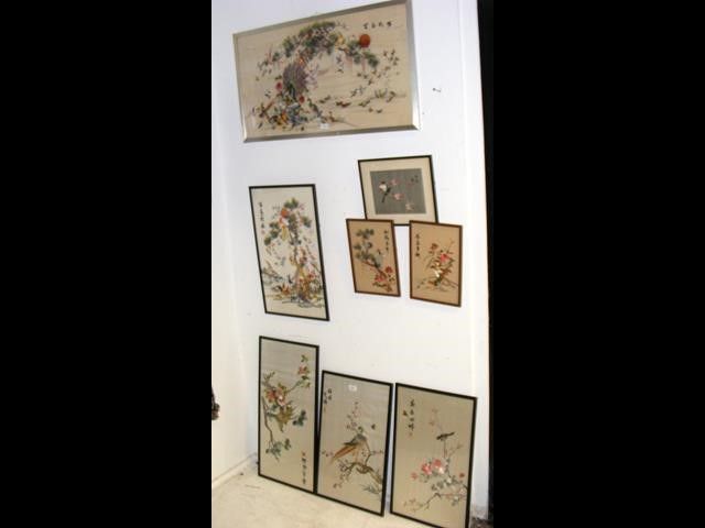 A selection of eight oriental silk and embroidery