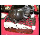 A 25cm carved wood Water Buffalo on pierced wooden