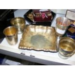 A silver cup, dish, etc.