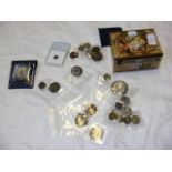 A tin of 19th/20th century coins, with an enamelle