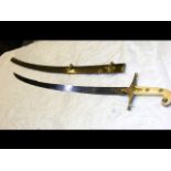 An antique Mameluke sword with engraved blade and