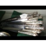 A set of twelve Kings Pattern silver handled knive