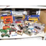 An assortment of die cast vehicles - boxed and loo