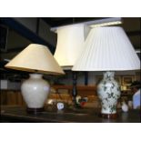 An Oriental style table lamp together with two others