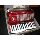 A Stella piano accordion in carrying case
