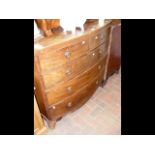 A mahogany bow fronted chest of drawers