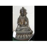 A Ming cast bronze Buddha with gilt decoration remains - 26cm