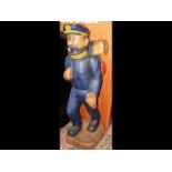 A 124cm high carved wooden figure of Captain Haddo