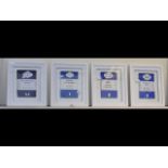 Four framed and glazed penguin books