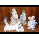 A cluster of four 'Nao by Lladro' figurines, inclu