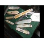 Selection of silver bladed and Mother of Pearl han