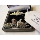 Two silver RAF brooches