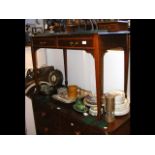 An Edwardian inlaid mahogany writing table with tw