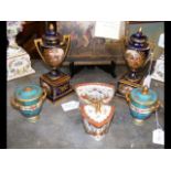A pair of Sevres vase and covers, together with a
