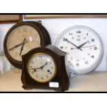 A trio of Smiths clocks: a school wall clock, an a