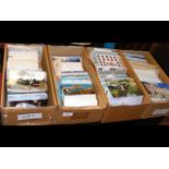 Four boxes of postcards