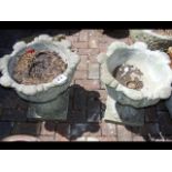 A pair of attractive garden urns on stands - 44cm