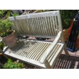 A slatted garden bench