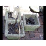 Three matching square garden pots