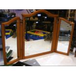 A pine triple dressing mirror with bevelled panels