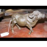 A 20cm long bronze horned cow ornament