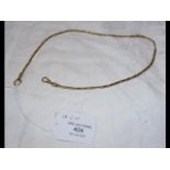 An unhallmarked yellow metal chain - 14.1g