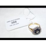 A sapphire and diamond ring in 18ct gold setting