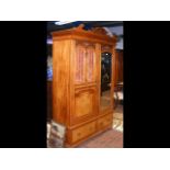 A 19th century decorative walnut wardrobe with two