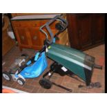 An electric Mac Allister lawn mower, together with