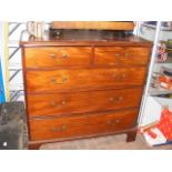 A 19th century mahogany chest of two short and thr