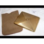 A 14ct gold cigarette case with sapphire knob - we